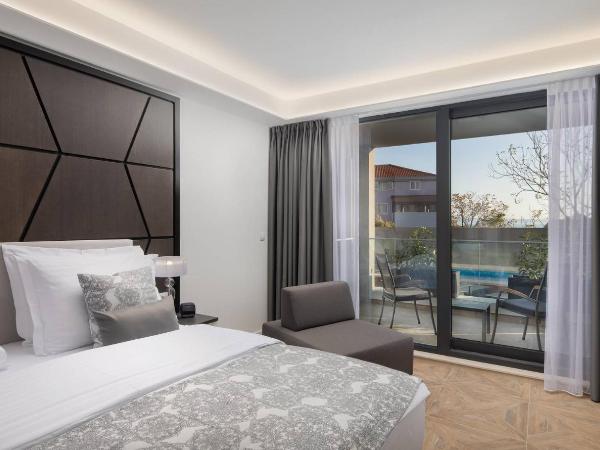 Ellure Luxury Suites : photo 3 de la chambre chambre adria lit king-size - côté piscine