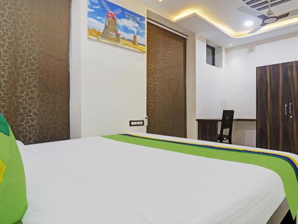 Treebo J A Royal Suites Manikonda : photo 4 de la chambre chambre double deluxe