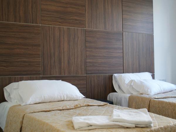 Brighton Beach Inn Hostel : photo 1 de la chambre chambre lits jumeaux avec salle de bains privative