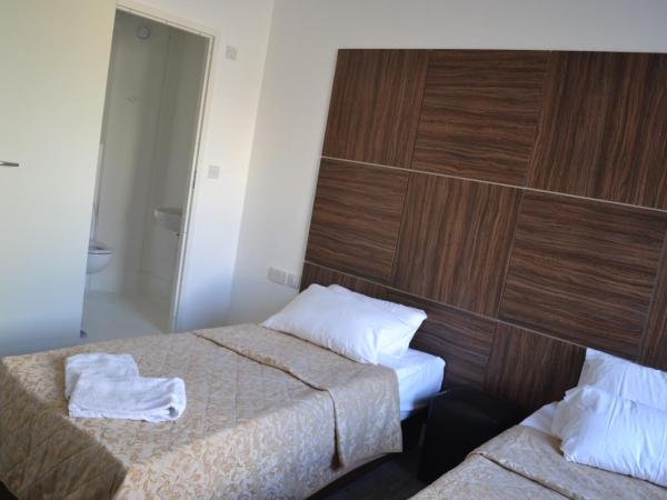 Brighton Beach Inn Hostel : photo 3 de la chambre chambre lits jumeaux avec salle de bains privative