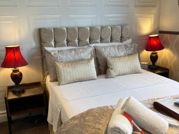 Raffles Hotel : photo 2 de la chambre chambre double avec salle de bains privative