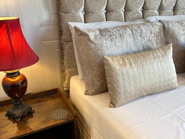 Raffles Hotel : photo 1 de la chambre chambre double avec salle de bains privative