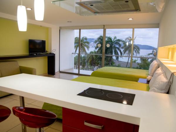 Ramada by Wyndham Acapulco Hotel & Suites : photo 7 de la chambre chambre double avec 2 lits doubles - non-fumeurs
