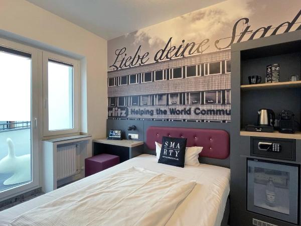 SMARTY Cologne Dom Hotel - Boardinghouse - KONTAKTLOSER SELF CHECK-IN : photo 3 de la chambre chambre simple