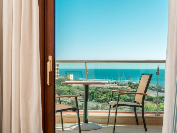 Smy Carlos V Wellness & Spa Alghero : photo 1 de la chambre chambre double avec balcon - vue sur mer