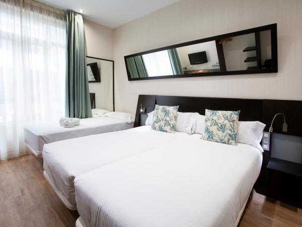 Petit Palace Ruzafa : photo 2 de la chambre chambre triple