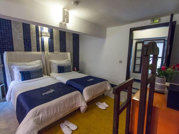 Riad Braya : photo 3 de la chambre chambre lits jumeaux avec salle de bains privative