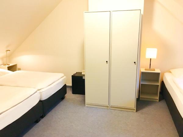 Hotel Kaiserswerth : photo 2 de la chambre chambre triple