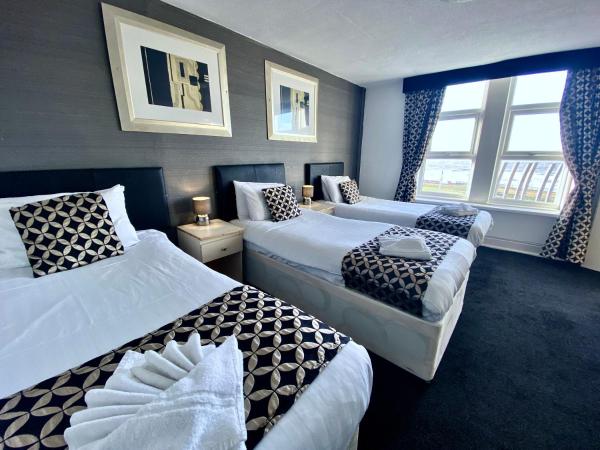 Royal Seabank Hotel : photo 1 de la chambre chambre triple - vue sur mer