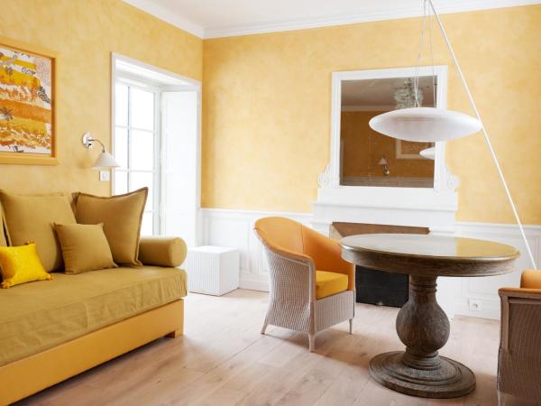 Chambres d'Hôtes Eden Ouest : photo 2 de la chambre suite jaune avec hammam privé