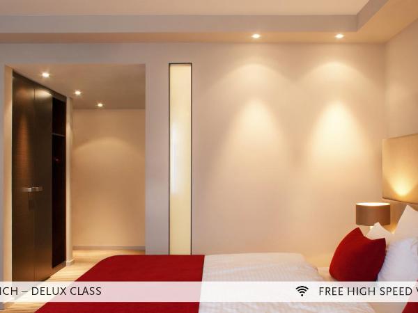 Marc München : photo 4 de la chambre chambre deluxe double ou lits jumeaux