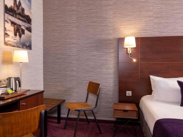 Hôtel L'Interlude : photo 2 de la chambre chambre double supérieure - vue sur cour