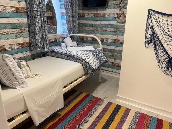 Raffles Hotel : photo 3 de la chambre chambre triple avec douche