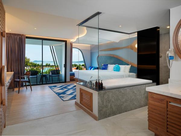 The Oceanic Sportel Phuket - SHA Extra Plus : photo 3 de la chambre chambre lit king-size - vue sur mer