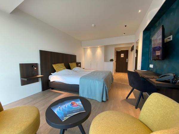 Vayamundo Oostende : photo 3 de la chambre chambre lits jumeaux avec vue latérale sur la mer

