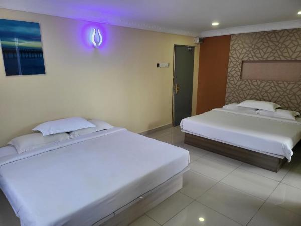 Poorna Hotel : photo 3 de la chambre chambre familiale deluxe