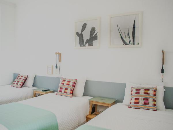 Residencial Avenida : photo 2 de la chambre chambre triple - vue sur mer