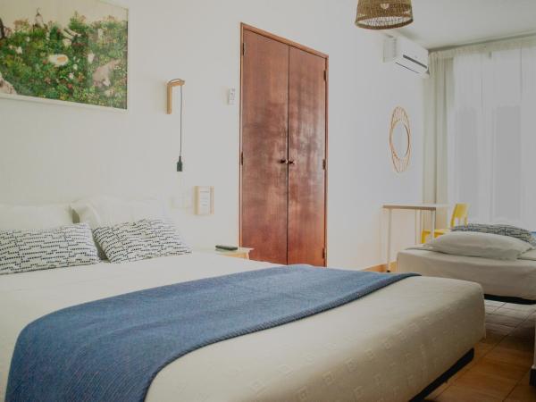 Residencial Avenida : photo 4 de la chambre chambre triple avec balcon