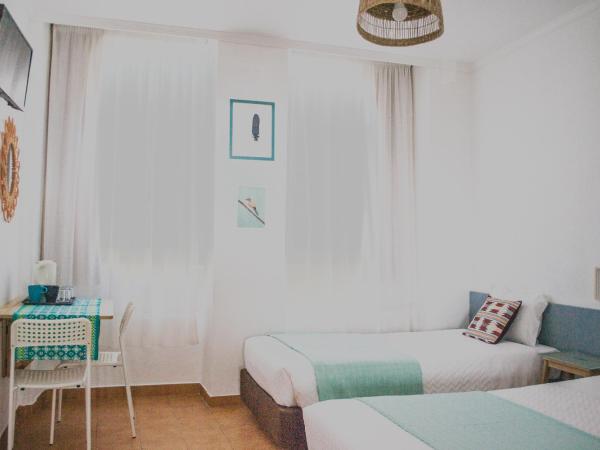 Residencial Avenida : photo 3 de la chambre chambre triple - vue sur mer