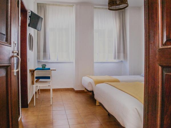 Residencial Avenida : photo 3 de la chambre chambre triple