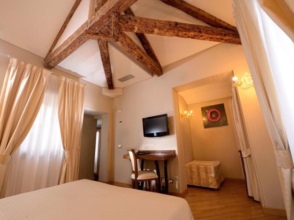 Hotel Paganelli : photo 9 de la chambre chambre triple