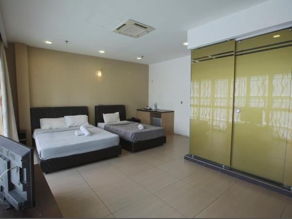 T Hotel Jalan Tar : photo 3 de la chambre chambre triple deluxe