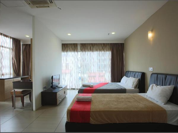 T Hotel Jalan Tar : photo 5 de la chambre chambre quadruple