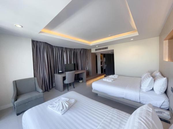 Hermann Hotel Pattaya - SHA Extra Plus : photo 7 de la chambre chambre triple - vue sur ville