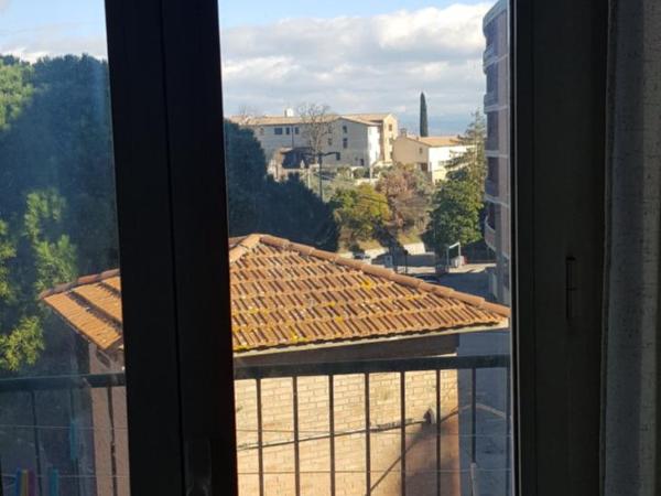 Vicino di Centro e Universita Stanza con balcone : photo 1 de la chambre chambre double ou lits jumeaux