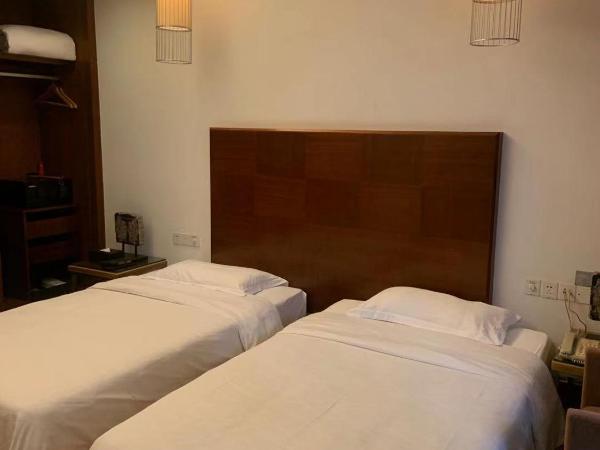 Guangzhou Fangyuan Hotel : photo 4 de la chambre chambre double ou lits jumeaux standard - vue sur jardin