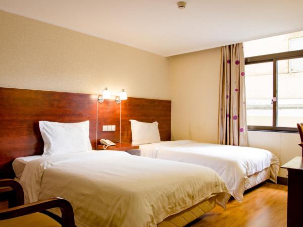 Guang Dong Hotel : photo 1 de la chambre chambre lits jumeaux