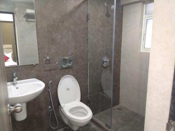 HOTEL INDUS INN : photo 5 de la chambre chambre deluxe double ou lits jumeaux