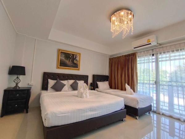 Bann Tawan Hostel Chiang Rai : photo 1 de la chambre chambre triple