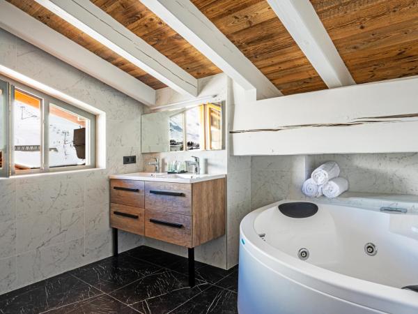 Hôtel Le Levanna by Les Etincelles : photo 6 de la chambre suite duplex privilège