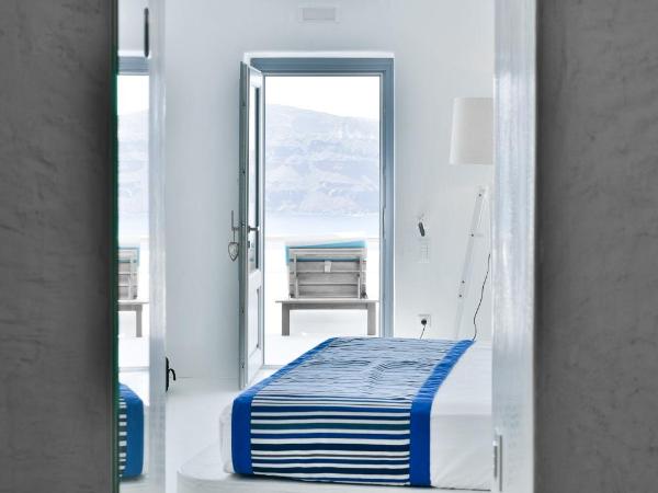 Maregio Suites : photo 3 de la chambre suite junior avec petite piscine extérieure chauffée avec jets