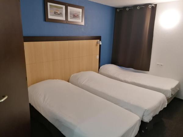 Enzo Hotels Vierzon by Kyriad Direct : photo 4 de la chambre chambre triple avec 3 lits simples