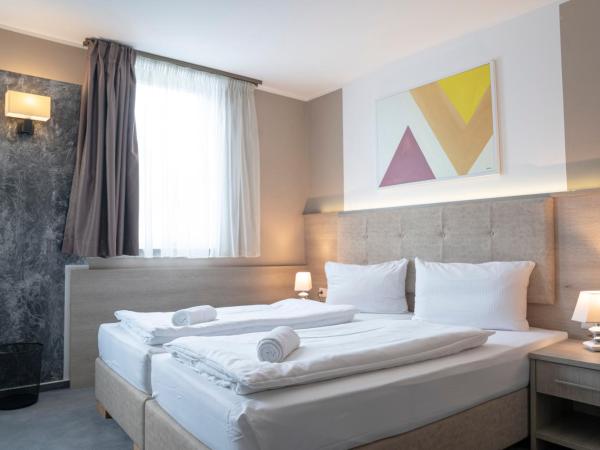 Alpha & Omega Hotel : photo 7 de la chambre chambre double