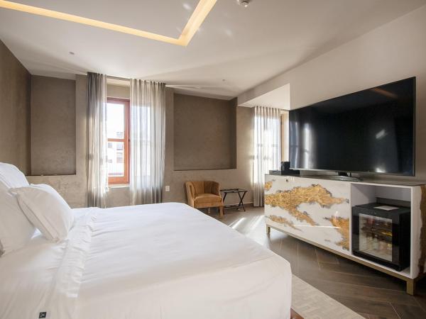 L Hotel Perla Boutique : photo 1 de la chambre suite deluxe avec lit king-size