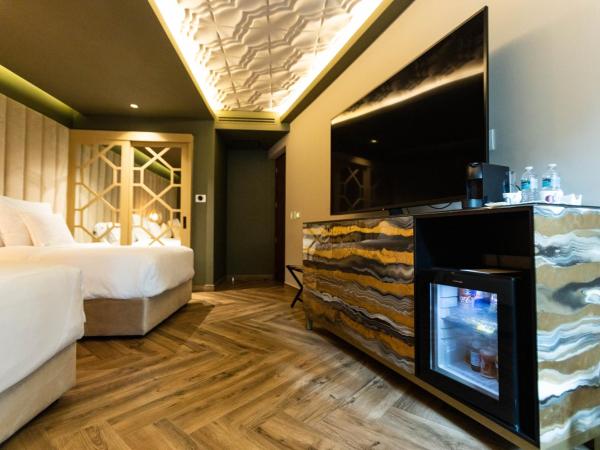 L Hotel Perla Boutique : photo 1 de la chambre chambre lits jumeaux avec balcon