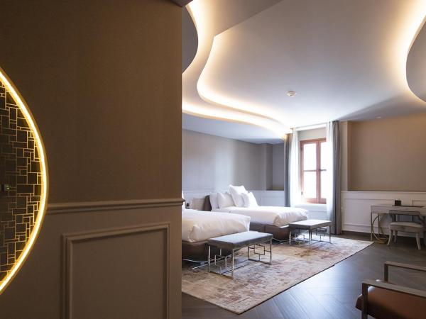 L Hotel Perla Boutique : photo 1 de la chambre chambre lits jumeaux avec baignoire