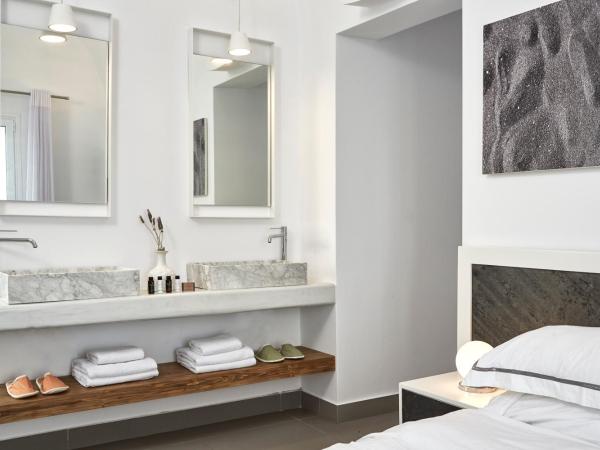 Loizos Stylish Residences : photo 4 de la chambre chambre premium avec baignoire extérieure