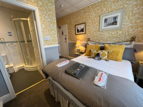 Raffles Hotel : photo 1 de la chambre chambre double avec salle de bains privative