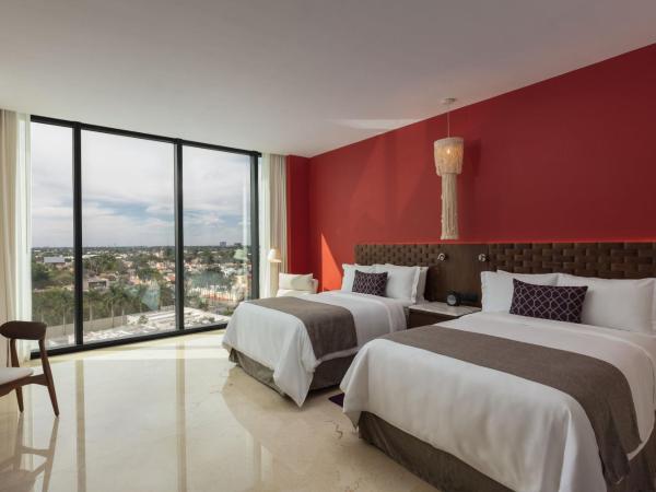 Camino Real Mérida : photo 1 de la chambre hébergement camino real club avec 2 lits