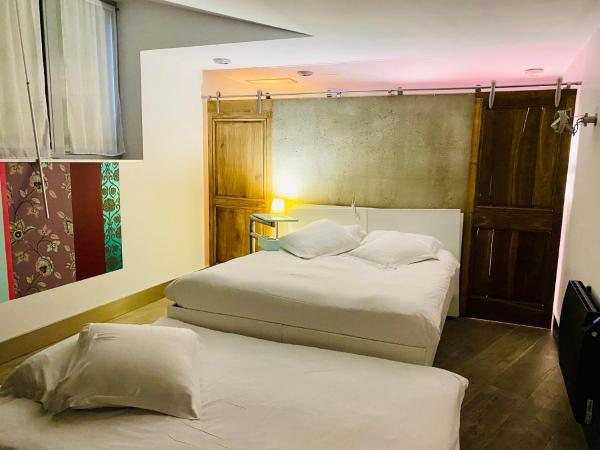 Hôtel Le Dormeur du Val : photo 3 de la chambre chambre familiale avec baignoire