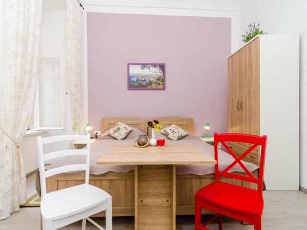 Rooms Tezoro : photo 3 de la chambre chambre triple - vue sur ville