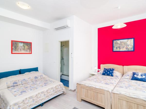 Rooms Tezoro : photo 3 de la chambre chambre triple confort avec vue sur la ville