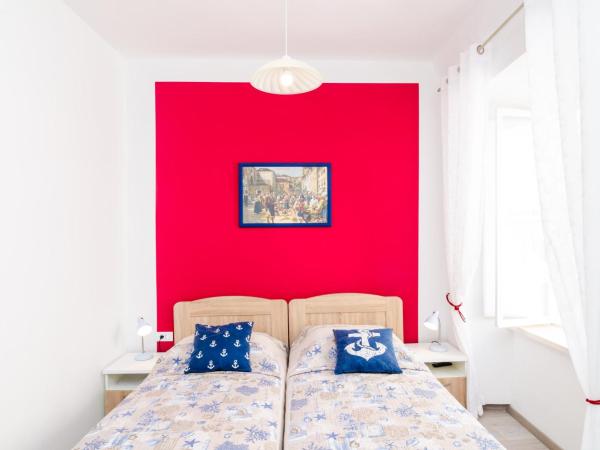 Rooms Tezoro : photo 6 de la chambre chambre triple confort avec vue sur la ville