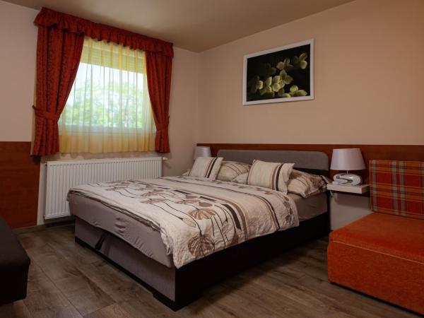 Erika Vendégház : photo 6 de la chambre chambre triple deluxe