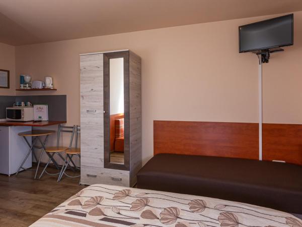 Erika Vendégház : photo 10 de la chambre chambre triple deluxe