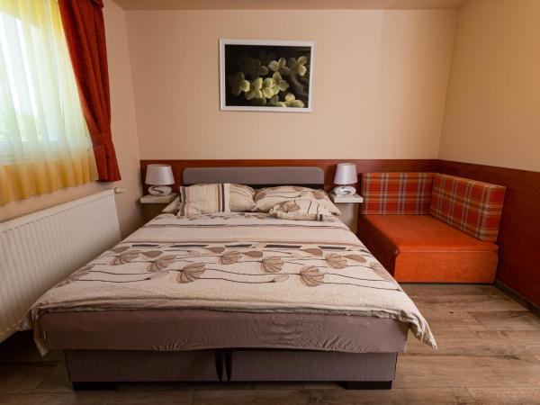 Erika Vendégház : photo 8 de la chambre chambre triple